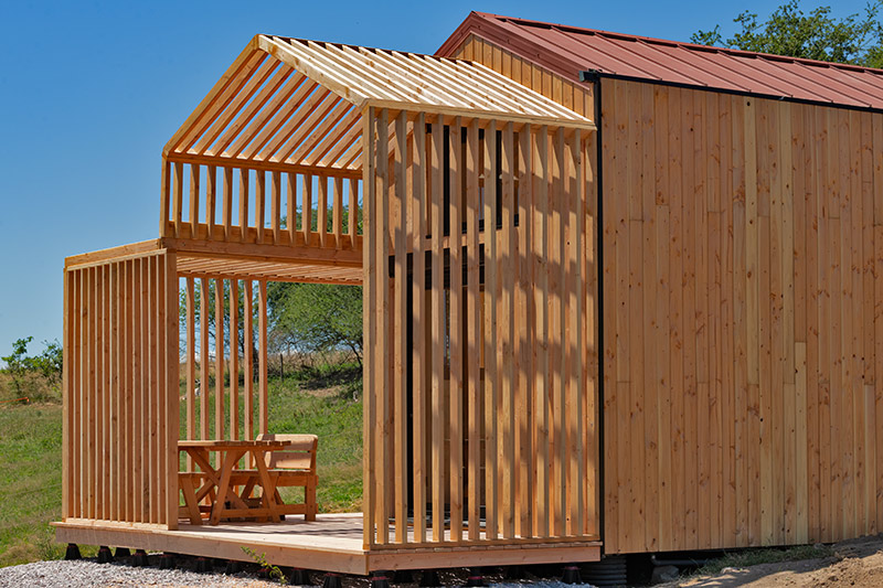 Pergola bois du COQhome ouverte sur la prairie